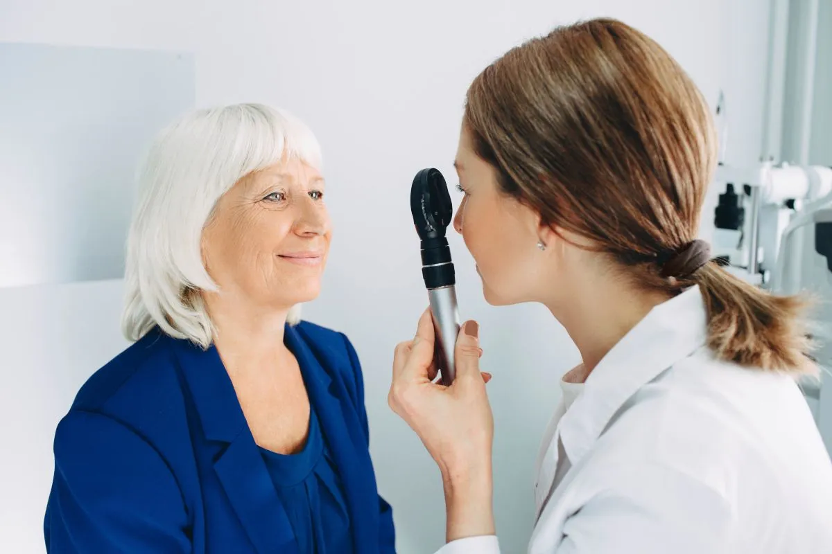 Ophthalmologist consulting with a senior patient