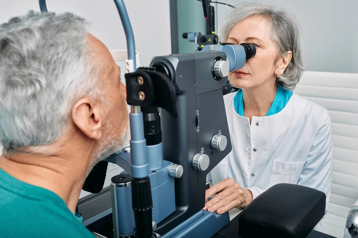 Doctor examining a senior patient's cornea